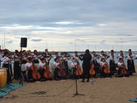 A youth orchestra plays at We Are Water 2019