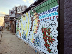 Mural on the side of Love's On Tap, 201 W. Mitchell St.
