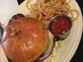 Butcher’s burger with onion strings