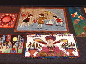 Rug Hooking on display at the Grohmann Museum. Photo by Erol Reyal