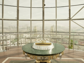 A golden handprint of the president Nazarbayev is exposed to the visitors in Bayterek tower in Astana. People are coming to the handprint to put their hand inside as its said making wishes to come true. Kazakhstan. 2013