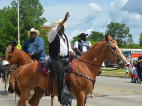 A cowboy on a horse
