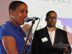 Melissa Goins, Maures Development Group, (ACRE Alumni) with Joaquin Altoro, Town Bank (ACRE Alumni) in background.