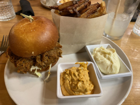 BBQ pork sandwich, garlic aioli, remoulade, and fries