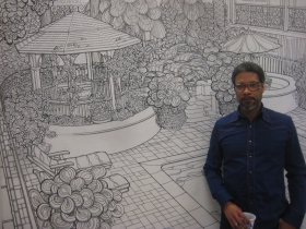 Reggie Baylor in front of his largest and most intricate composition.