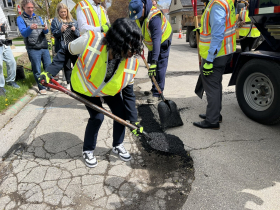 Alderwoman Sharlen P. Moore Fills a Pothole