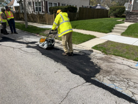 DPW Crew Smooths Asphalt