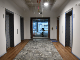 Elevator Lobby with Outdoor View at Renovated NM North Building