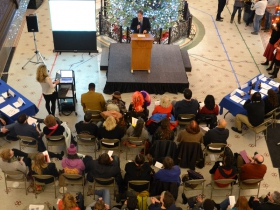 Alderman Murphy welcomes a packed City Hall.