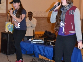 Two Milwaukee sisters perform a song together.