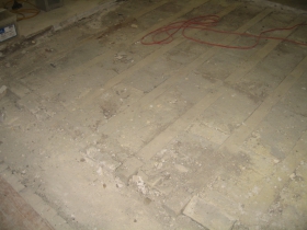 Fireproofing original to the building's floors