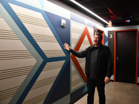 Joel Plant Shows Off Signature Wall at Landmark Credit Union Live