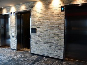 Cream City Brick Elevator Lobbies at The Trade
