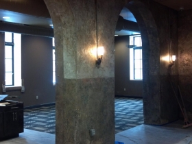 Brick archways in The Brewhouse Inn & Suites.