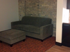 Comfortable couch and ottoman.