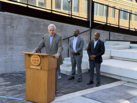 Alderman Robert Bauman at Gary P. Grunau Memorial Plaza Ribbon Cutting