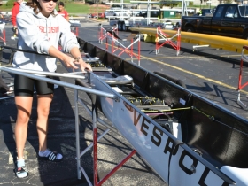 This Wisconsin Rower Explains how to Fasten the Premier Racing Boat's 16 Oarlocks