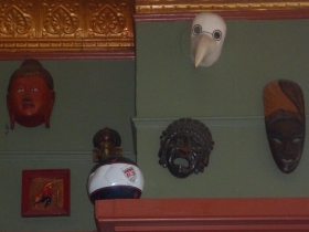 Masks on the wall of the Nomad. 