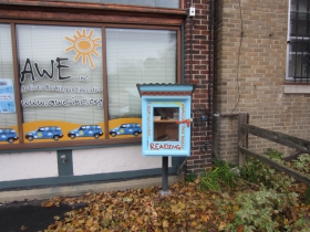 This Little Free Library is located in front of Artists Working in Education's offices.
