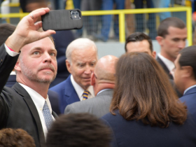 Selfie with President Biden in Background