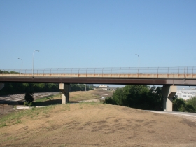 A road bridges across the park.