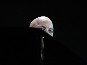 Billy Joel sneaking a peek over the piano.