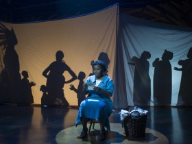 Zonya Love as Celie and cast pictured in Milwaukee Repertory Theater’s 2014/15 Quadracci Powerhouse production of The Color Purple.