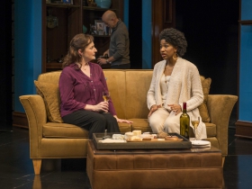 Laura Gordon and Jennifer Latimore (foreground), and Michael Elich (background) in Milwaukee Repertory Theater’s 2014/15 Quadracci Powerhouse production of Good People.