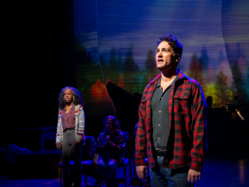 Milwaukee Repertory Theater presents Come From Away in the Ellen & Joe Checota Powerhouse November 4 – December 14, 2025. Pictured L to R: Dayna Jarae Dantzler and Adam Rennie