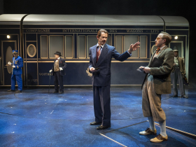 Milwaukee Repertory Theater presents Murder on the Orient Express in the Quadracci Powerhouse June 1 – July 1, 2022. Pictured Center L-R: Jonathan Wainwright and Will Mobley