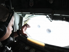 Zach Pulido Signals to Trailing C-17 From KC-135 Boom Window
