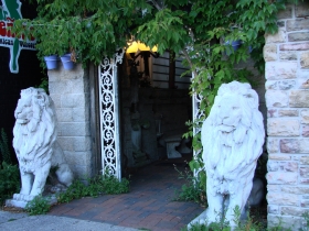 Lions in front of patio entrance.