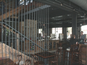 A view of the staircase and bar.
