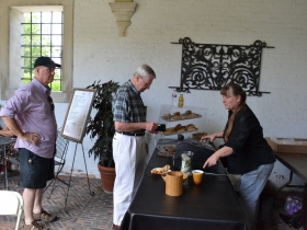Guests buy coffee and baked goods from the Courtyard vendor