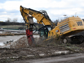 Excavator Goes Downhill at Northridge Demo Site