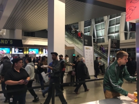 A Bucks fan grabs a beer inside the Golden 1 Center.