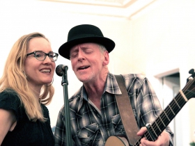 Willy Porter and surprise guest Carmen Nickerson performed at the County Grounds Coalition potluck social on Friday, Dec. 1 2017.