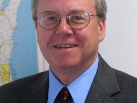 Dennis Smith, the former Secretary of the State Department of Health Services.