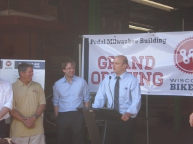 Alderman Nik Kovac speaks at the opening of the Pedal Milwaukee Building.