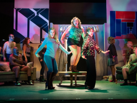 (l. to r.) Christie Burgess (Pam Lukowski), SaraLynn Evenson (Estelle Genovese), Janet Metz (Vicki Nichols) and the cast of Skylight Music Theatre’s production of The Full Monty running September 24 – October 17, 2021.