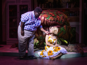 (l. to r.) Kevin James Sievert (Seymour) and Ashley Oviedo (Audrey) in Skylight Music Theatre’s production of Little Shop of Horrors running November 19, 2021 - January 2, 2022.