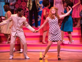(l. to r.) Gilbert Domally (Seaweed J. Stubbs) and Ann Delaney (Penny Pingleton) with the cast in rehearsal for Skylight Music Theatre’s production of Hairspray November 16 – December 30.