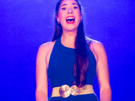 Laura Paruzynski as the Narrator in Skylight Music Theatre’s production of Joseph and the Amazing Technicolor® Dreamcoat, running November 14 through December 28, 2025