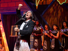 Alex Campea as Potiphar, William Toney as Potiphar Attendant, Jesse Weinberg as Potiphar Attendant, Vivian Romano as Potiphar Attendant, and Jake Horstmeier as Potiphar Attendant in Skylight Music Theatre’s production of Joseph and the Amazing Technicolor® Dreamcoat, running November 14 through December 28, 2025