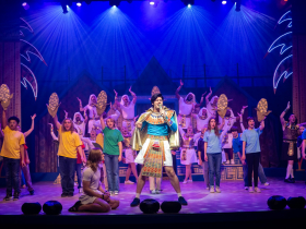 (I to r front line) Mason Hanizeski as Joseph and Alex Campea as Pharaoh, and the cast in Skylight Music Theatre’s production of Joseph and the Amazing Technicolor® Dreamcoat, running November 14 through December 28, 2025