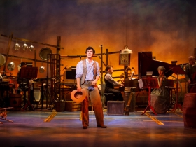 Lucas Pastrana (Curly McLain), center, in Skylight Music Theatre’s production of Oklahoma! September 27 – October 13.