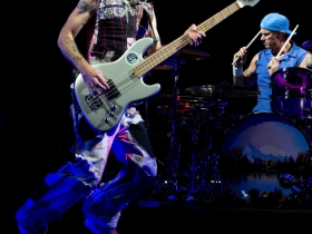 Flea, leaping on stage