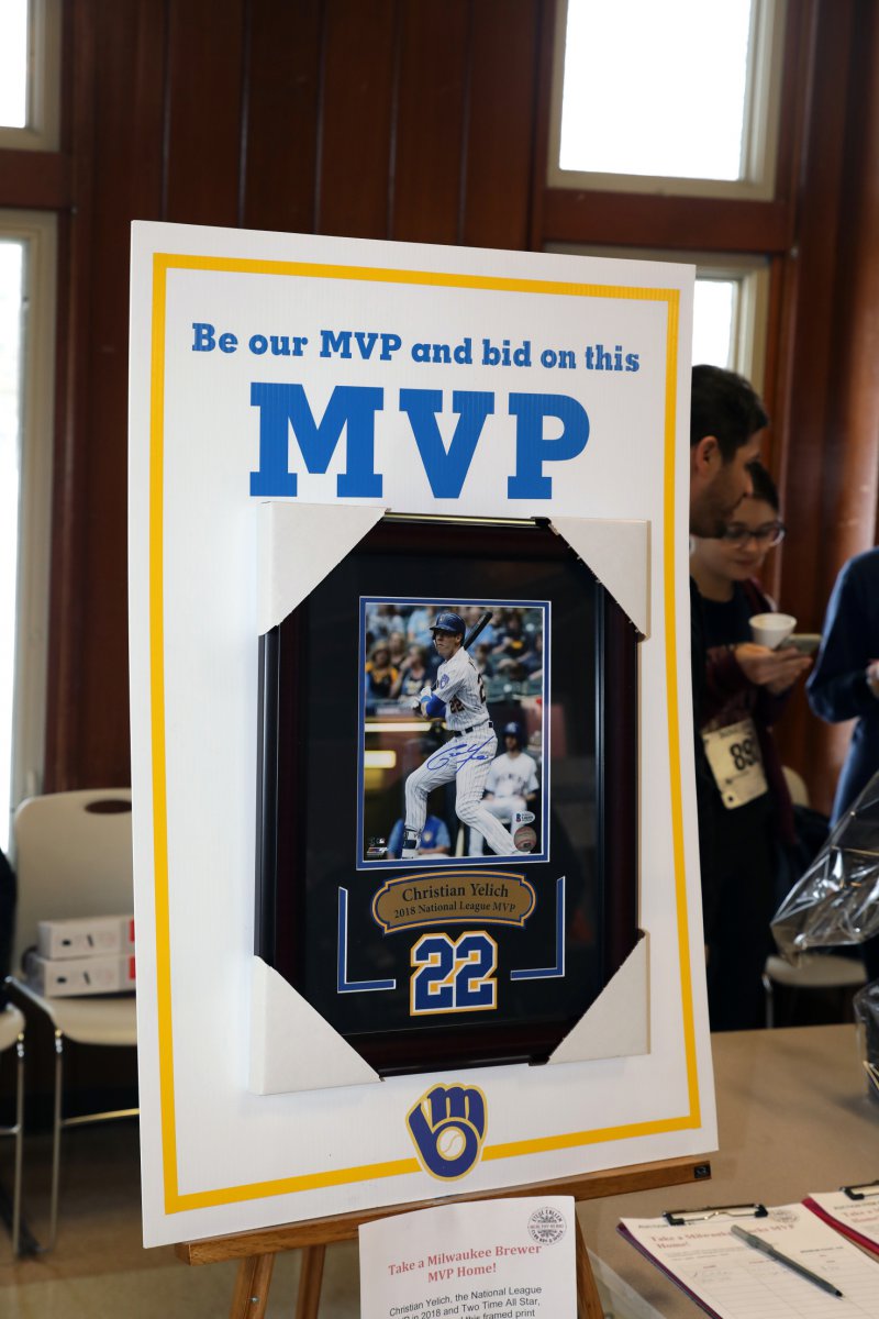 Silent auction hand signed print of Milwaukee Brewers 2018 National League MVP, Christian Yelich.
