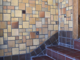 An exceptional installation of Flandria and deco tiles installed on the rare dado at the Julien Apartments on Vliet St.