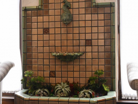 A rare dolphin-spout fountain with tiles from the Mosaic Tile Co. of Zanesville, Ohio, is located in a East Side funeral home today known as Heritage Funeral Homes, Suminski/Weiss Chapel, built in 1926.